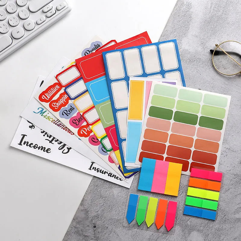 Handwritten label indicating adhesive stickers in white with multiple grid formats and colour options