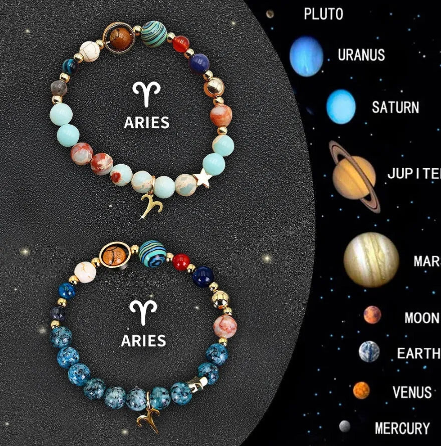 Two natural stone beaded bracelets on a table representing zodiac sign jewellery.