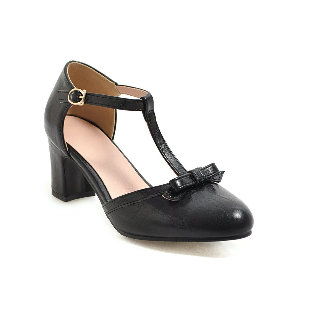 Women's chunky heel sandals with hollow-out design and decorative bow in solid colour with buckle strap