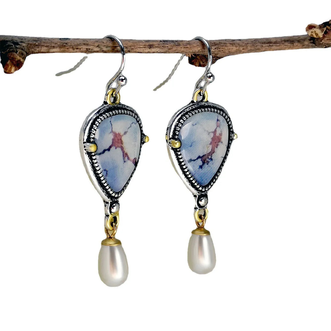 Retro blue drop earrings with geometric design featuring synthetic opal and pearl elements on electroplated metal