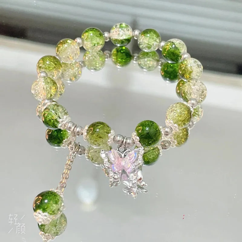 Chinese style glass bracelet with bamboo joint details in a red Lvzhu Duobao design.