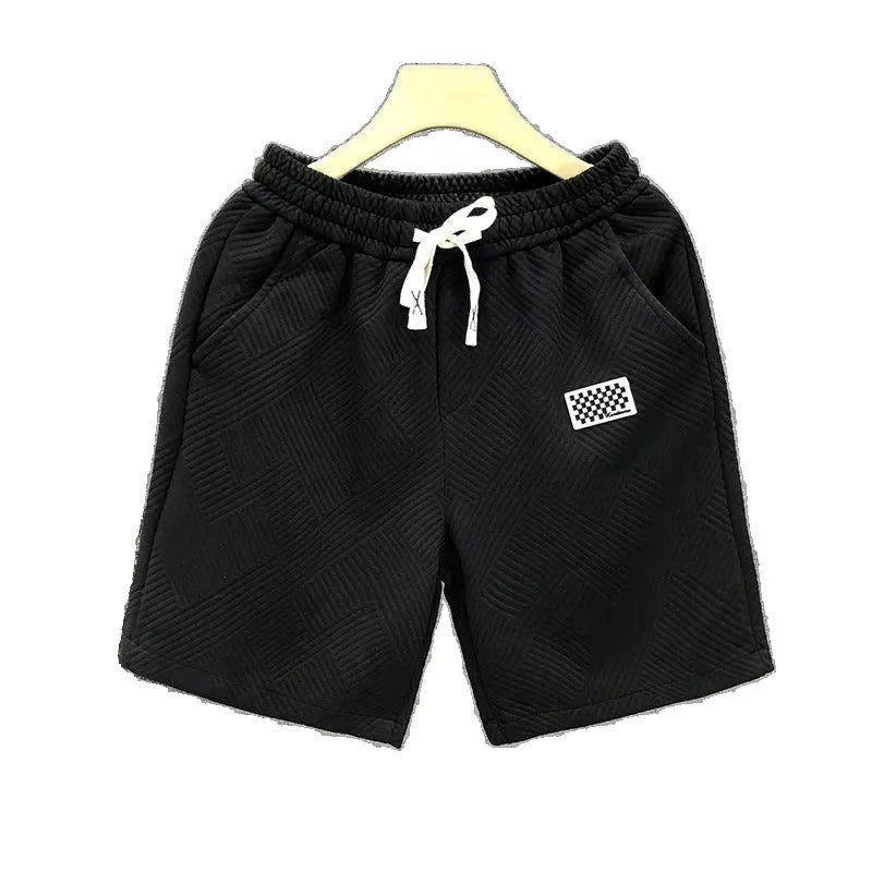 Casual polyester sports shorts with micro elasticity in black, white or green colours