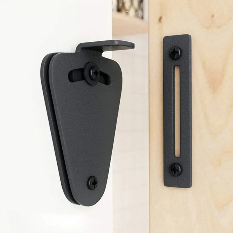Black stainless steel sliding barn door lock for interior doors.