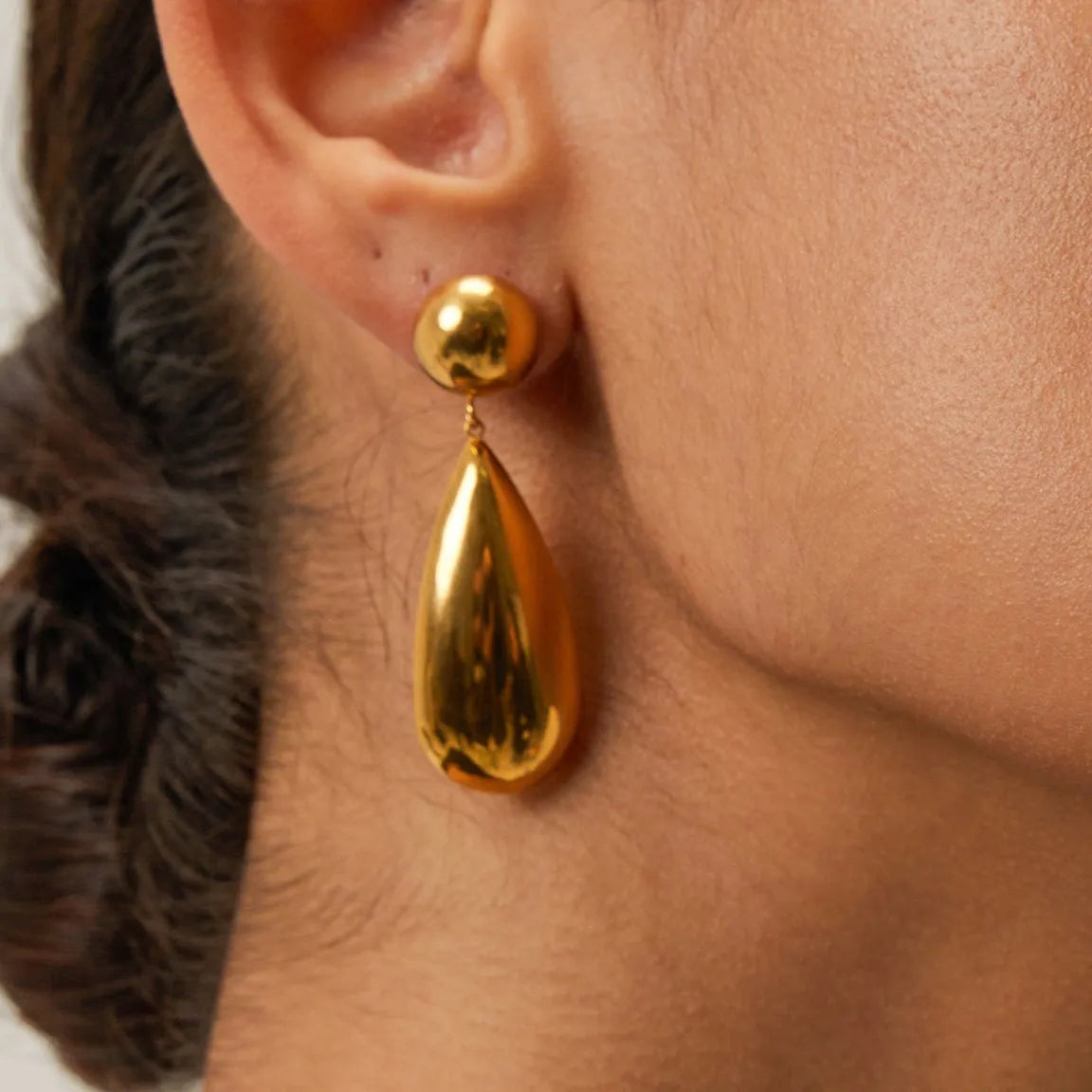 Geometric water drop stainless steel earrings with gold electroplated finish and hemisphere design details