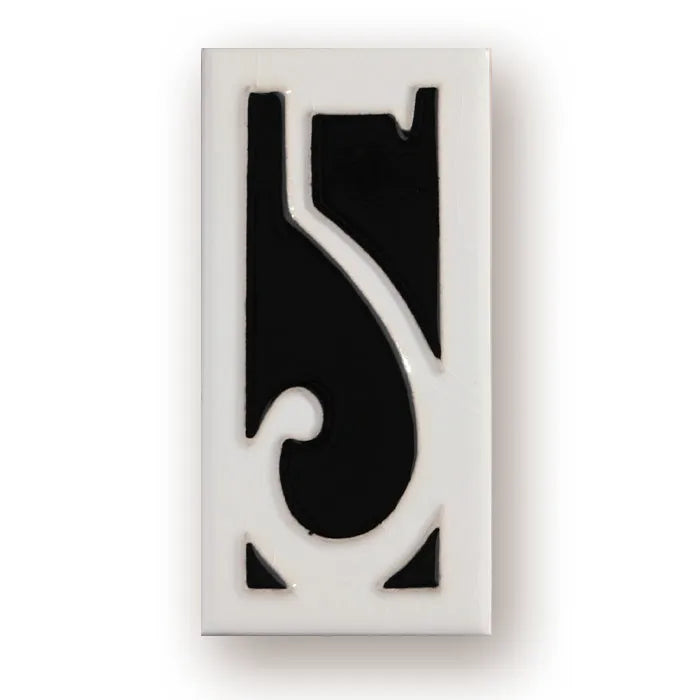 Handmade retro enamel ceramic doorplate showing a number on a glossy surface