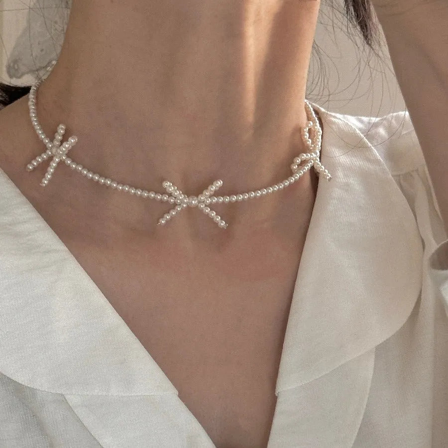 Women's sweet bow pearl necklace with geometric design on adjustable 31-40cm chain