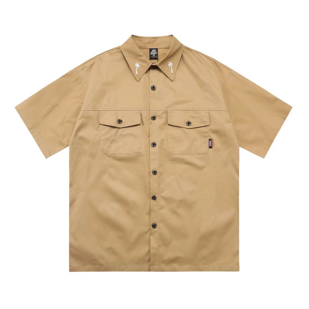 Men's loose black half-sleeve cotton shirt with embroidered chest pocket detail