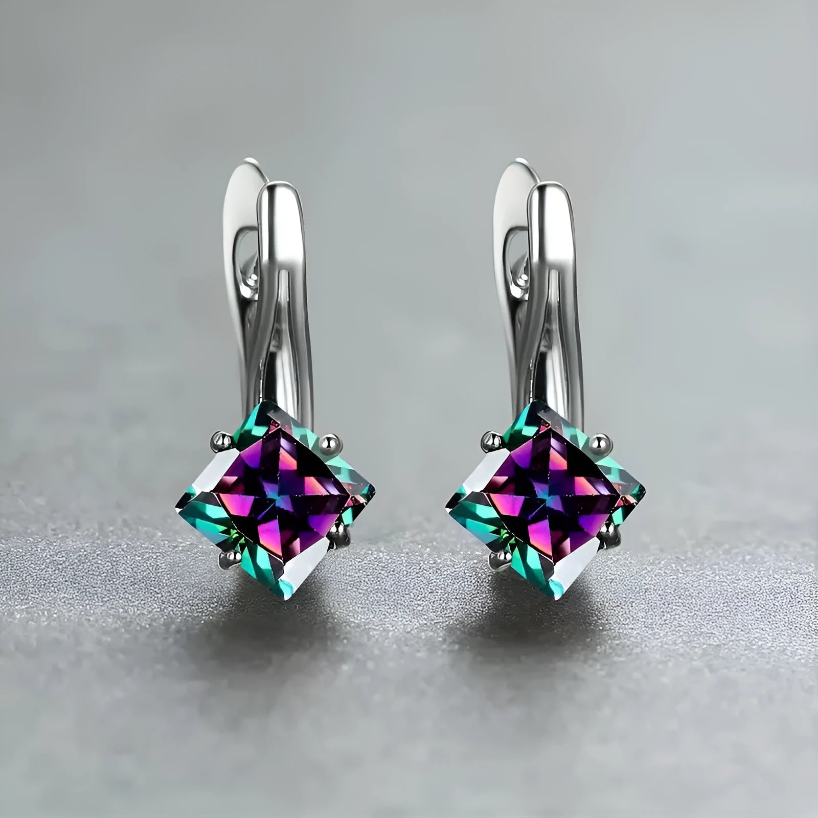 Women's copper earrings with diamond design pattern and zircon inlaid gemstones in blue, green and colour variations