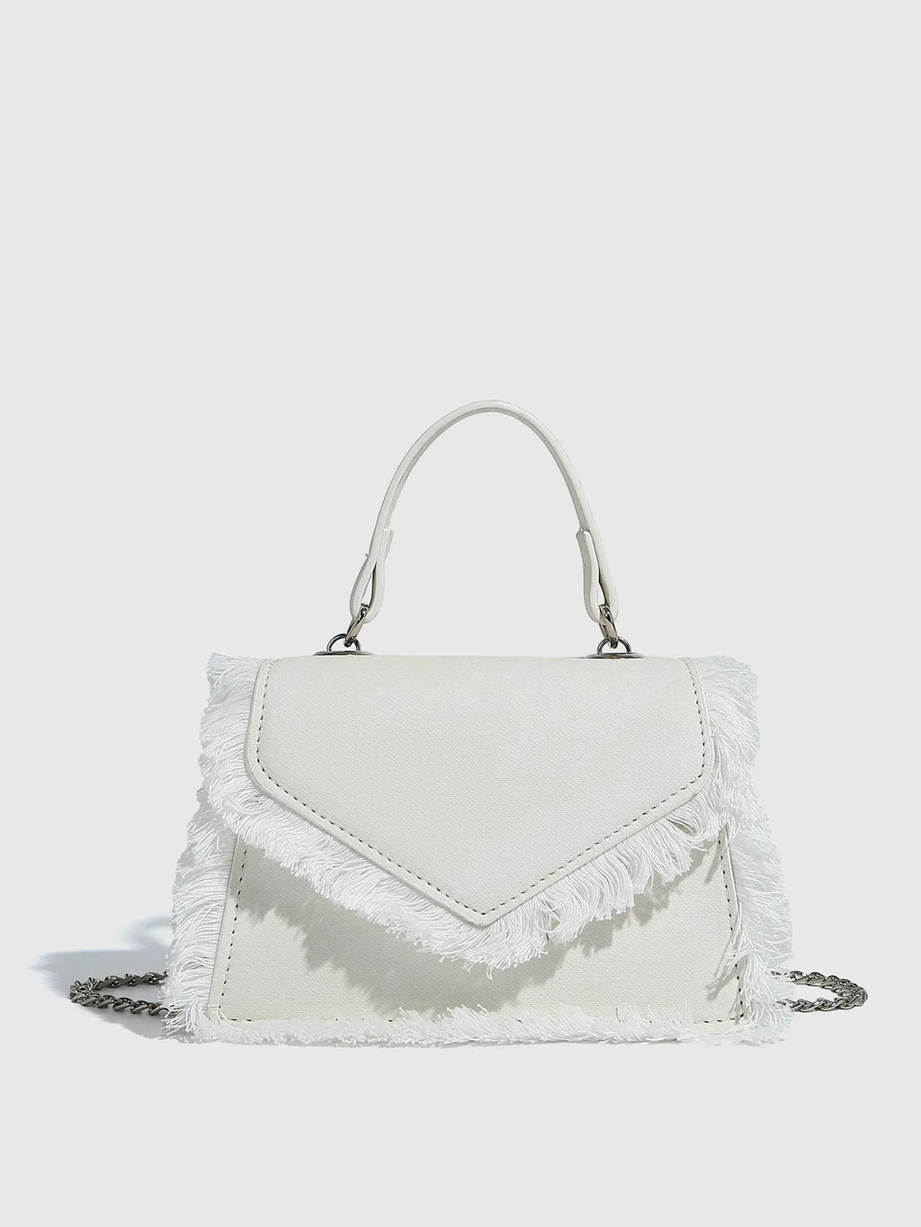 Retro tassel bag mini crossbody bag in denim blue colour, PU material, with tassel detail and crossbody strap.