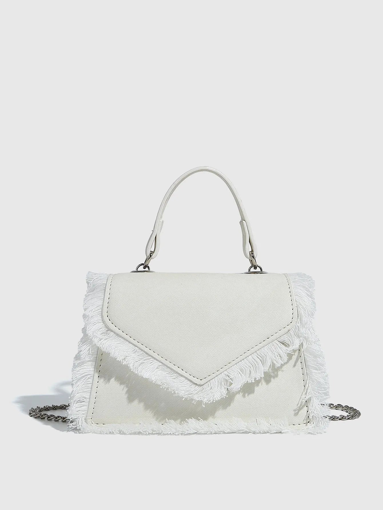 Retro tassel bag mini crossbody bag in denim blue colour, PU material, with tassel detail and crossbody strap.