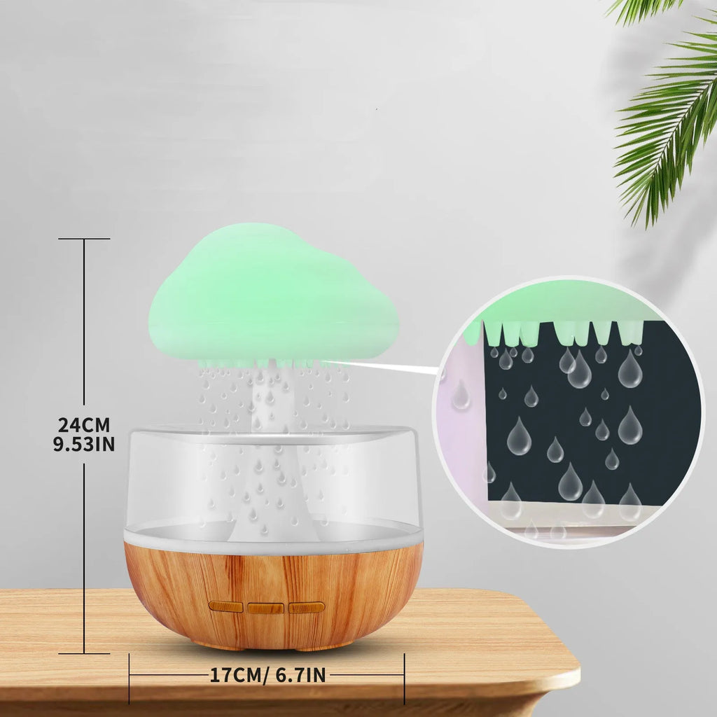 White cloud-shaped humidifier with coloured lights and water droplets