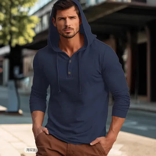 Men's dark blue cotton pullover hoodie with long sleeves on a hanger.