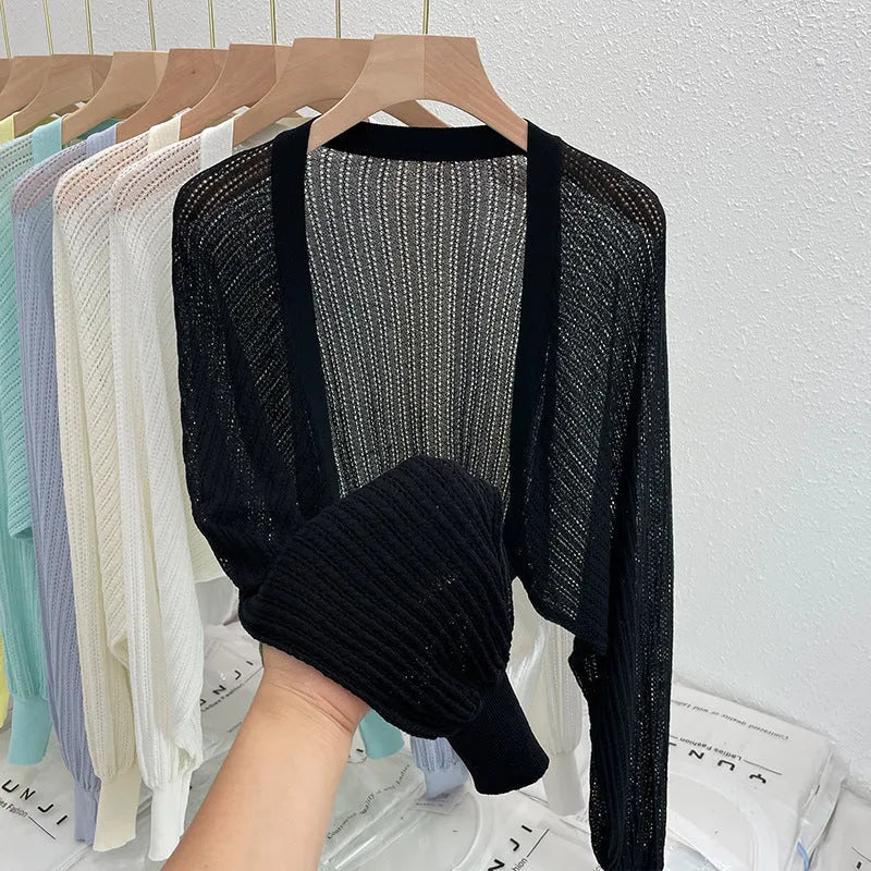 Women's linen blouse with hollow-out design and long lantern sleeves in apricot colour