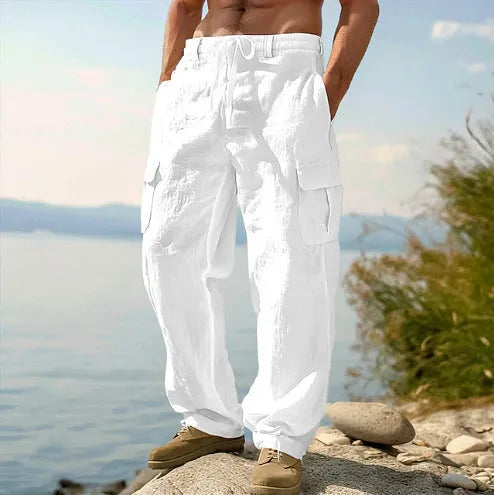 Men's loose cotton wide-leg casual trousers in light army green colour on a hanger.