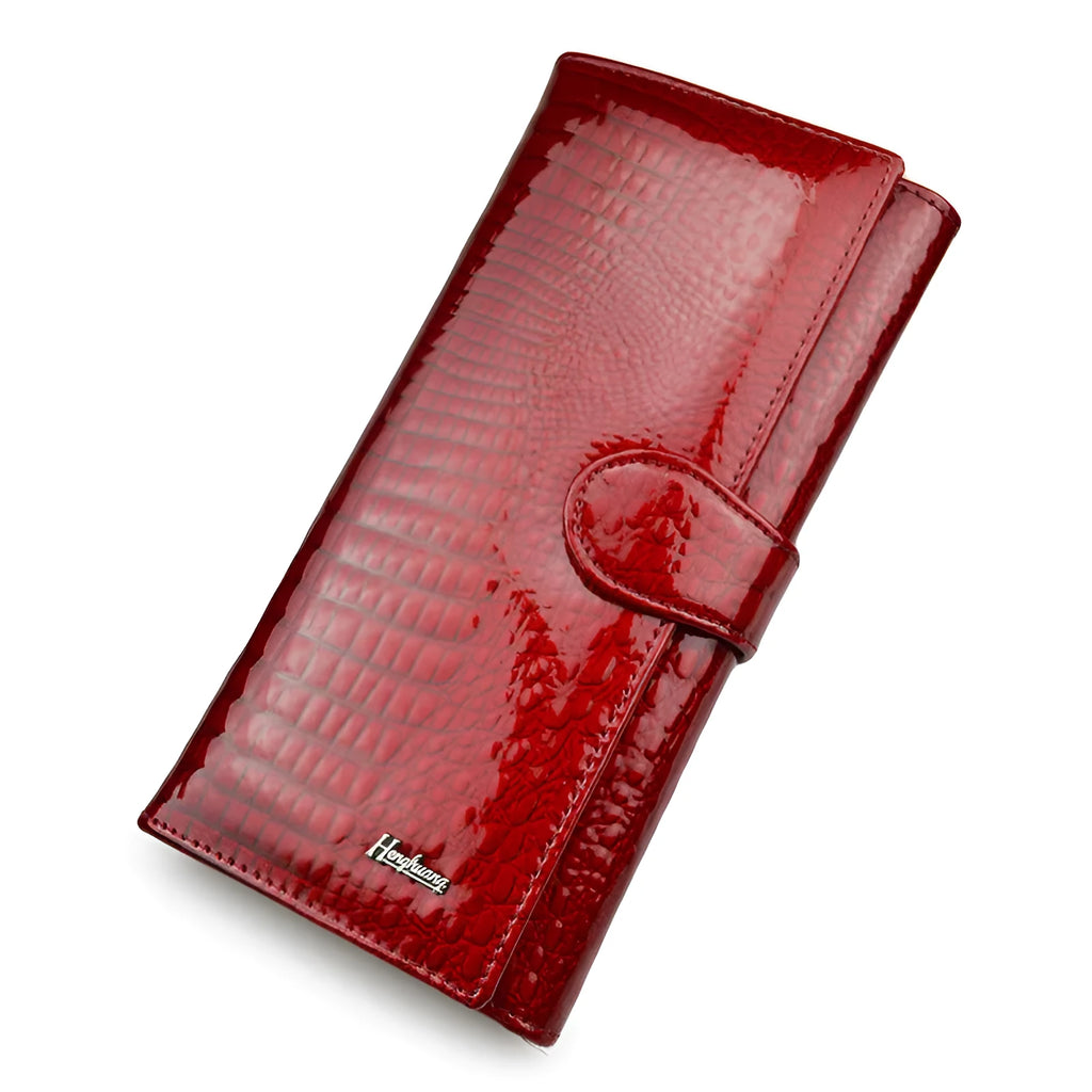 Women's leather coin purse with crocodile pattern texture in red colour
