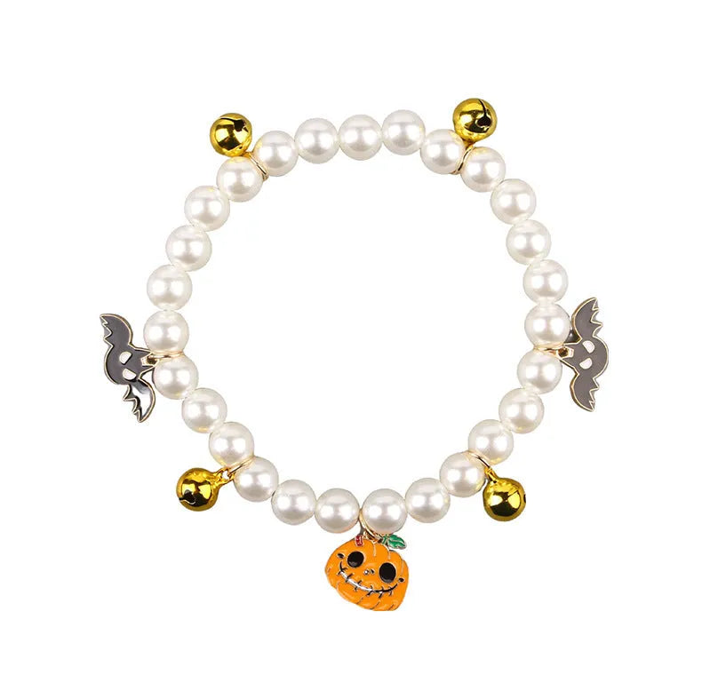 Halloween cat collar decoration with simulated pearls and pumpkin designs