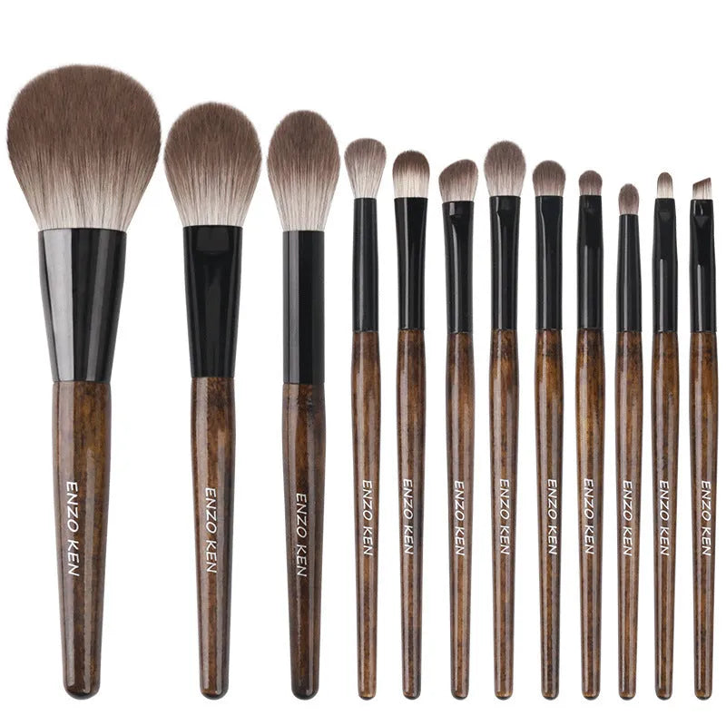 12-piece makeup brush set with wooden handles stored in black PU brush bag