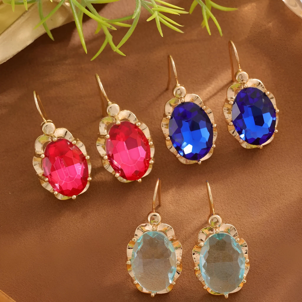 Pair of diamond studded earrings in polished zinc alloy, available in light blue, rose red, and royal blue colours