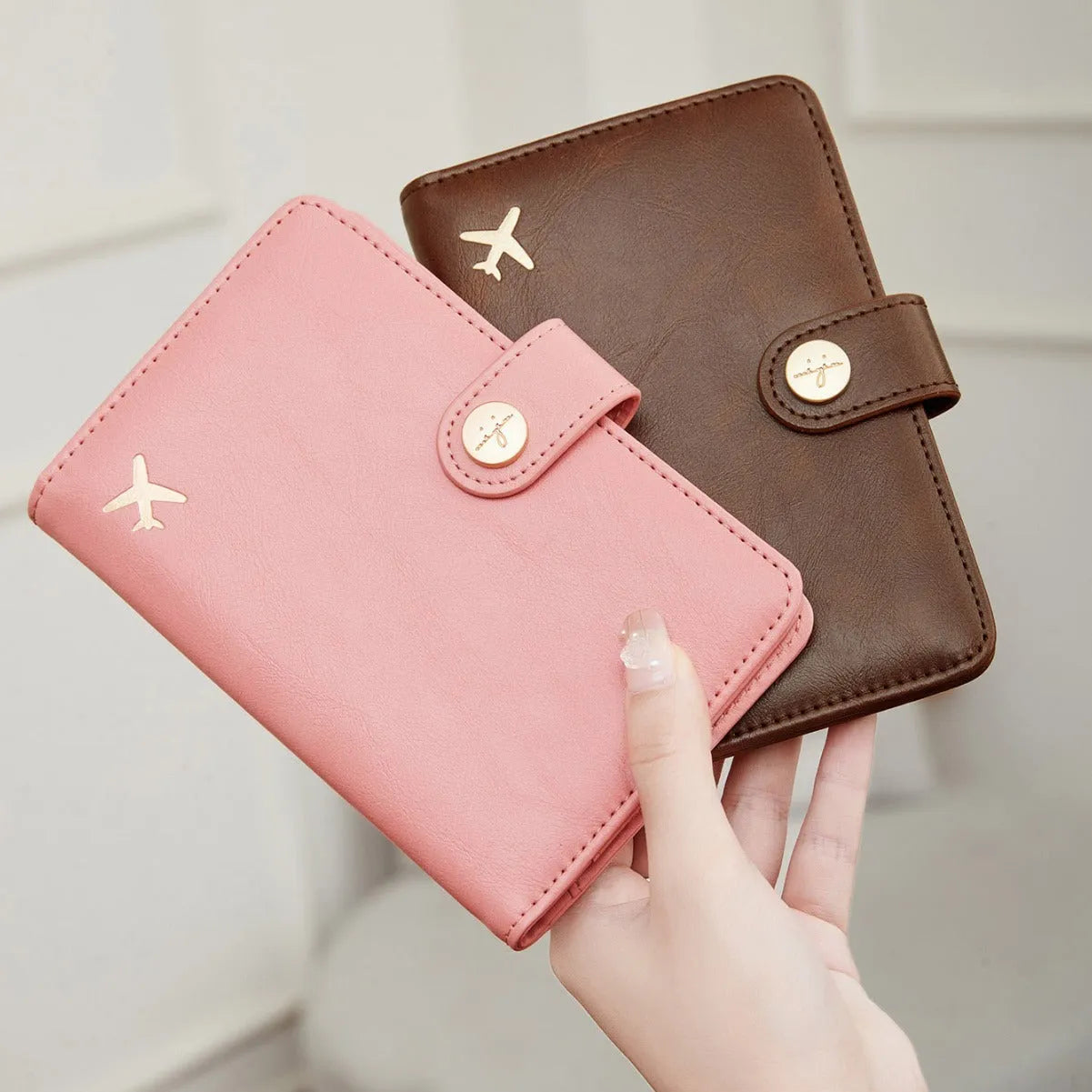 PU passport holder wallet with sewing line detail in multiple colour options showing document storage compartments