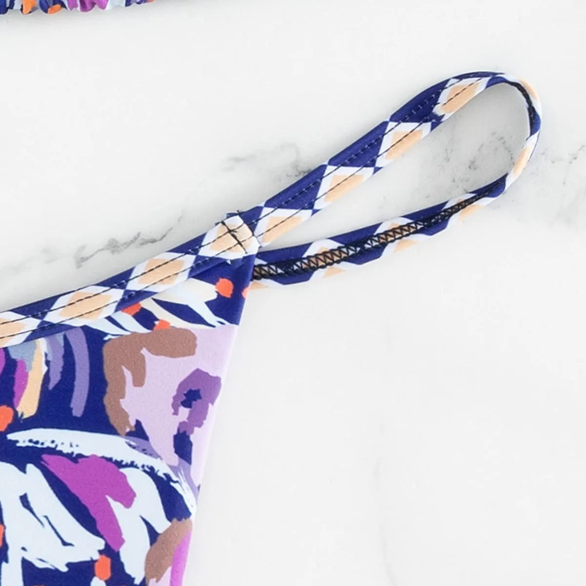 Women's floral print triangle bag swimsuit in polyester fabric with briefs cut