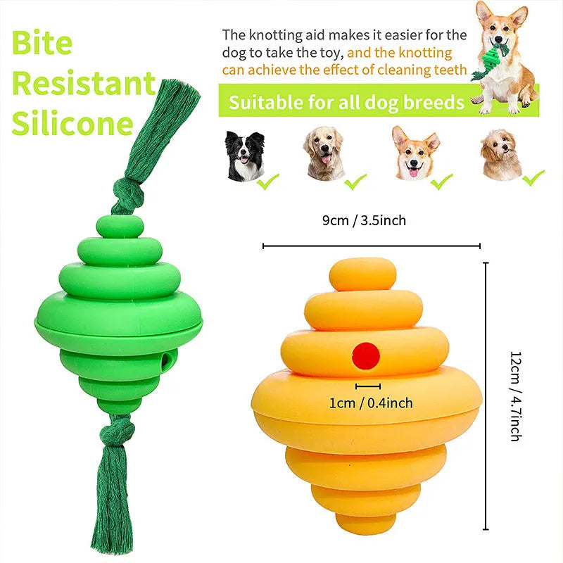Green and yellow food-dispensing silicone dog ball with an attached rope for tug-of-war.