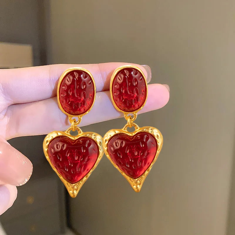 Alloy oval love heart stud earrings with pleated detail in four colour options