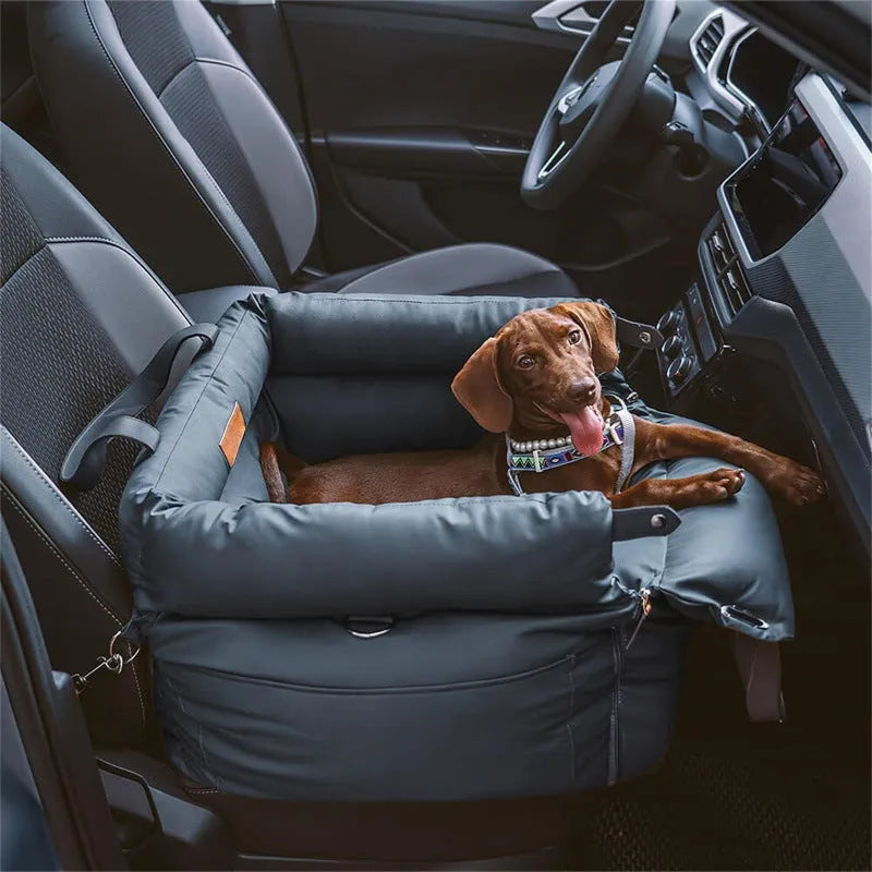 Green waterproof PU leather dog car nest with removable cover, shown in a car footwell.