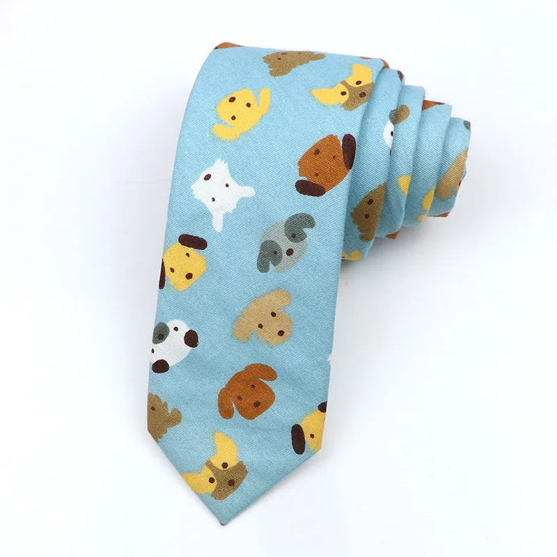 Narrow cotton bow tie with a printed cartoon pattern in a selection of colours.