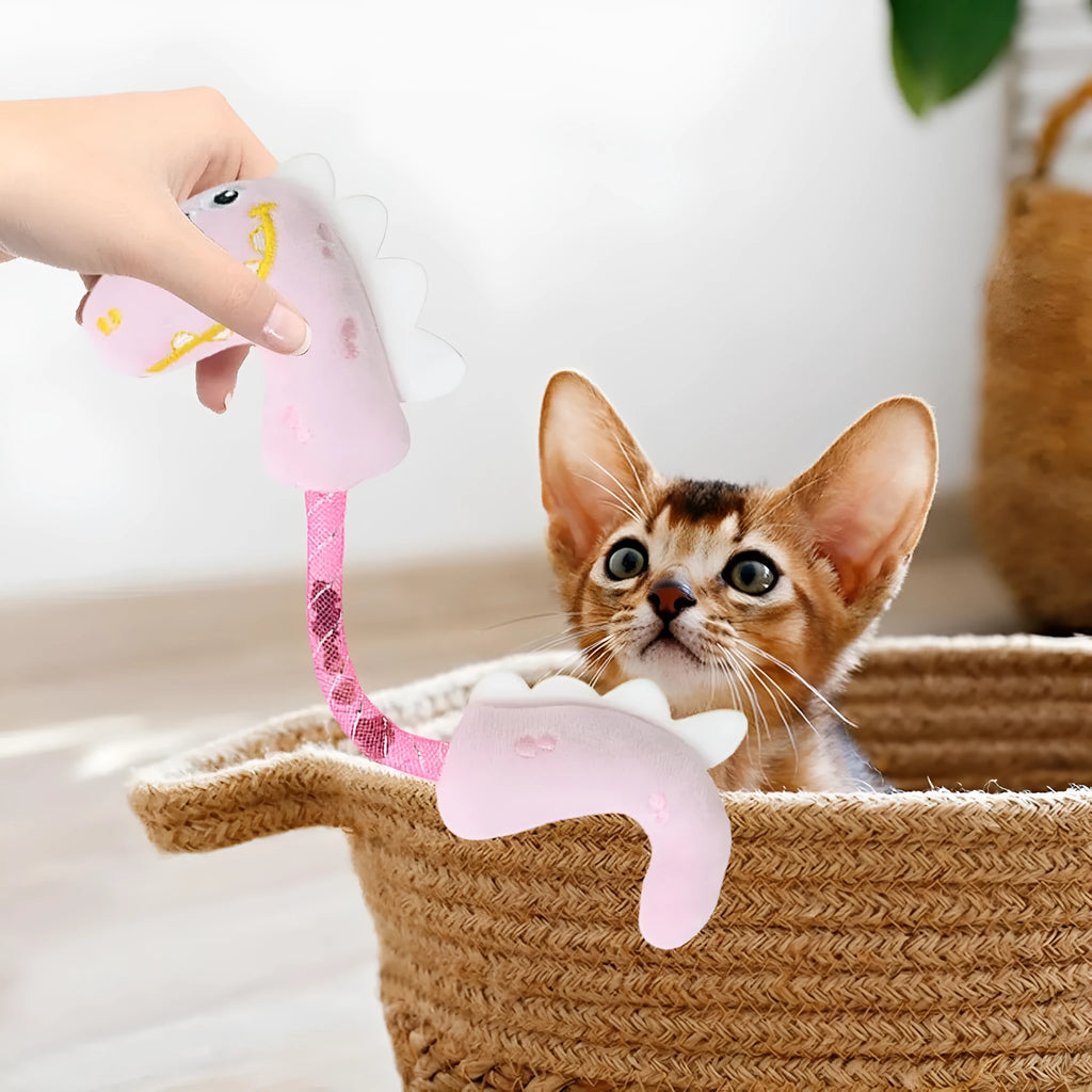 Bundle of four cat toys including rope toys, springs, kicker toys, and plush chew toys in pink, purple, or yellow colours