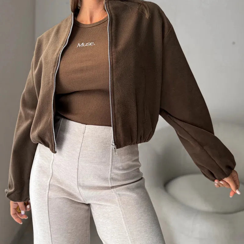 Women's off-shoulder short coat with lantern sleeves in milky white colour showing loose casual fit