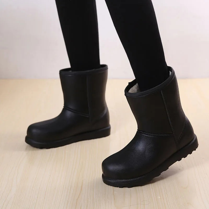Women's mid-calf EVA waterproof snow boots with velvet lining, platform heel, round toe, in black