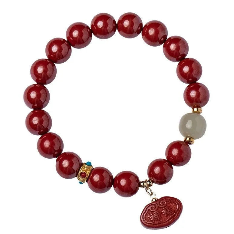 Natural cinnabar bracelet with Emperor sandstone Ping An Fu Lu design showing 8mm and 10mm bead size options.