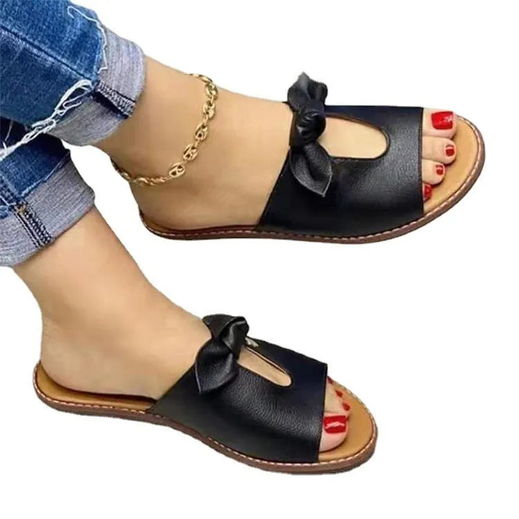 Ladies fish mouth sandals with a bow on the artificial PU upper, shown in black, pink, or gold.