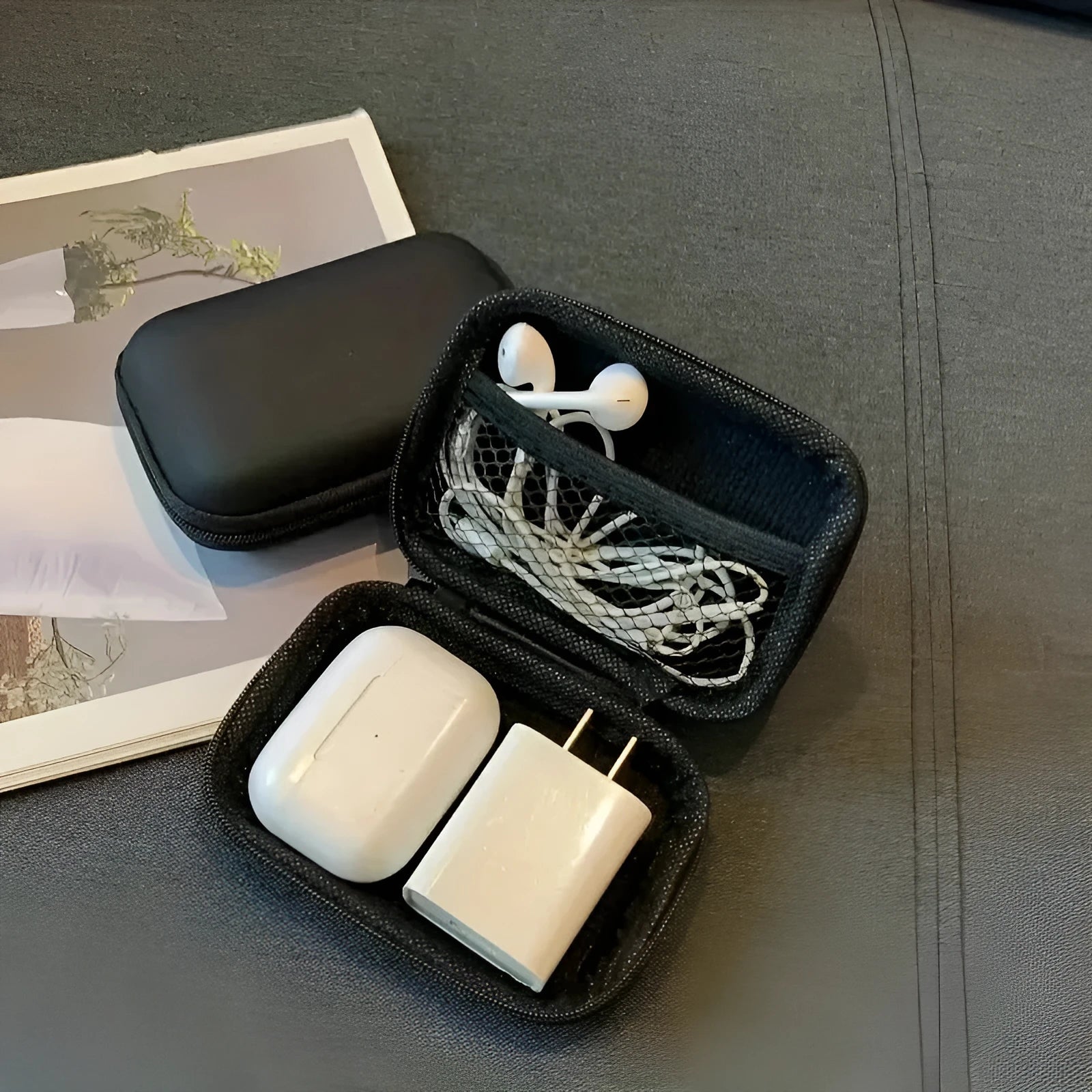Compact black EVA travel storage box 11x7.5x4cm for headset and cable organisation
