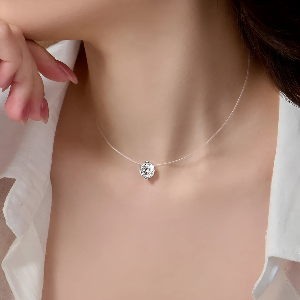 Women's silver moissanite pendant necklace on invisible fishing line with plum blossom design