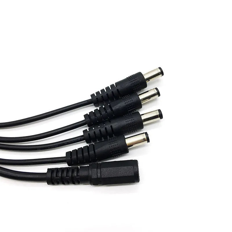 Black 12V DC 4-way power splitter cable with 5.5mm connectors for CCTV camera systems