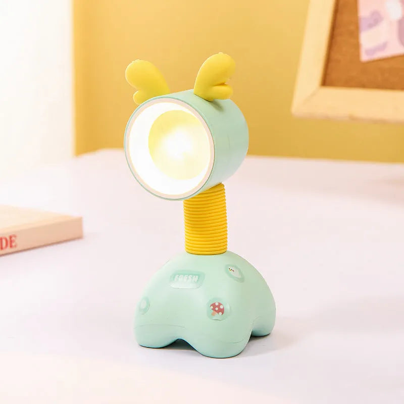 Cartoon animal magnetic night lamp with adjustable head on metallic surface
