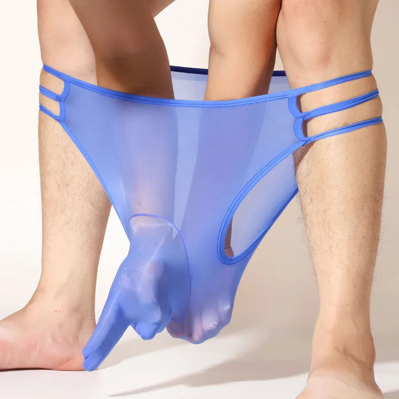 Men's transparent elephant nose shorts in stretch nylon fabric on a mid-waist model.