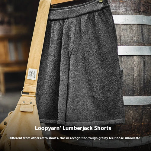 Cement grey straight leg polyester sports shorts with elastic waistband