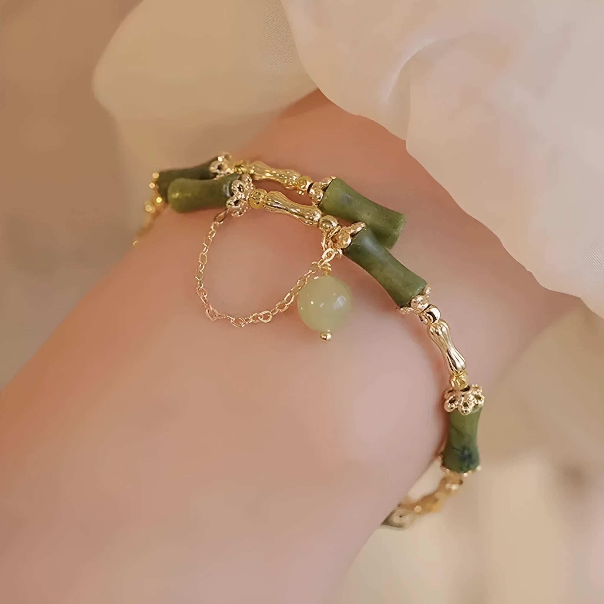 Women's bamboo beaded bracelet in plum wine colour with coloured glass and bamboo joint design.