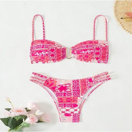 Women's orange high-waisted floral bikini swimsuit with matching bra