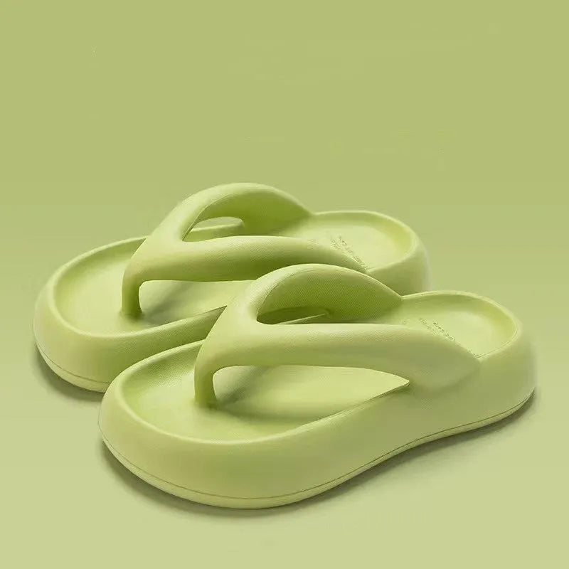 Solid colour thick-soled EVA flip-flops with decorative bow on strap.