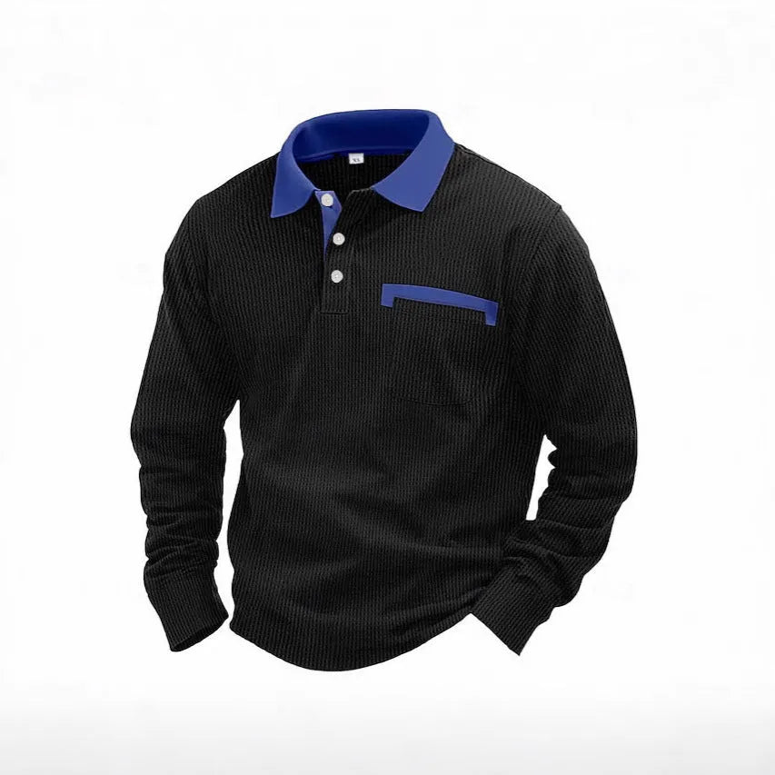 Man wearing a long-sleeved waffle knit polo shirt in a solid colour with an asymmetric design detail.