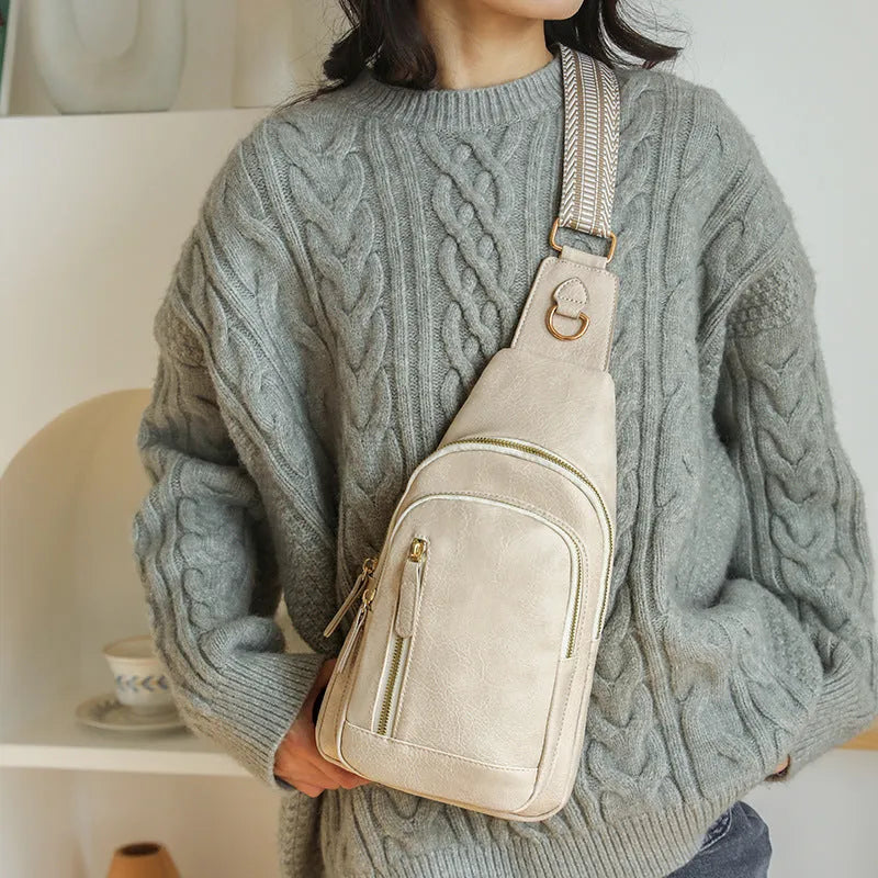 Small brown PU leather crossbody bag with sewing thread details and zip compartments