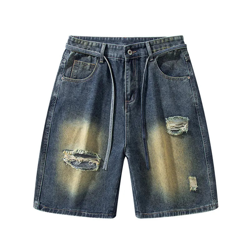 Men's loose-fit ripped jeans in retro blue cotton denim with streetwear styling