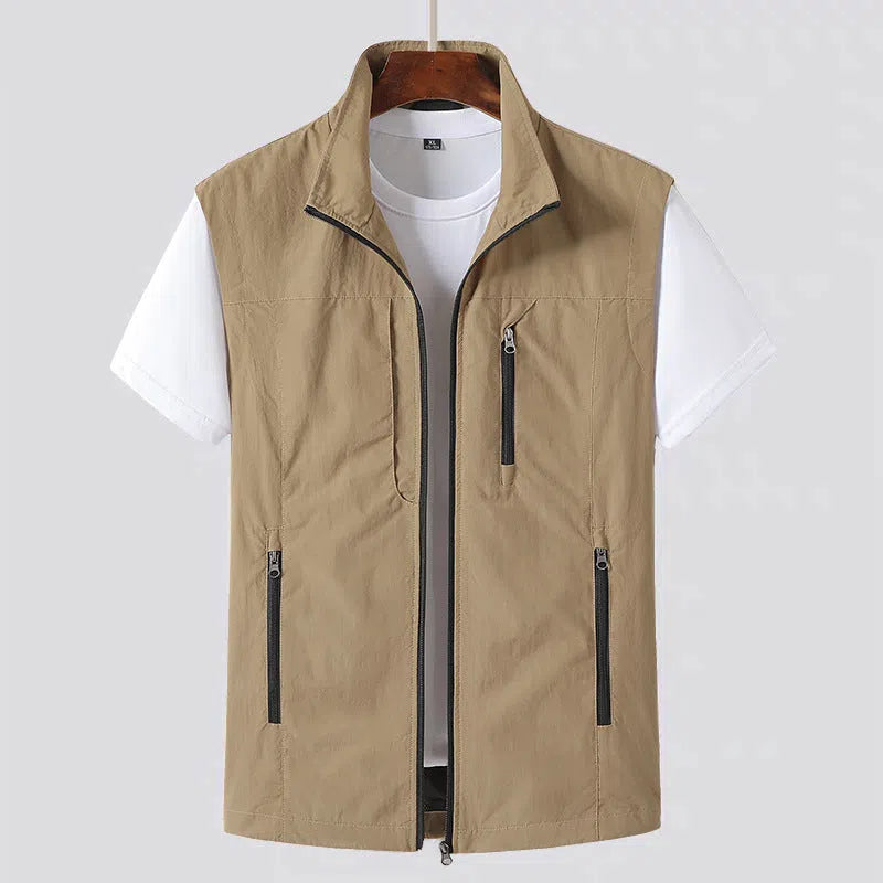 Breathable multi-pocket outdoor casual vest jacket in khaki, slim fit with zippered pockets and straight hem