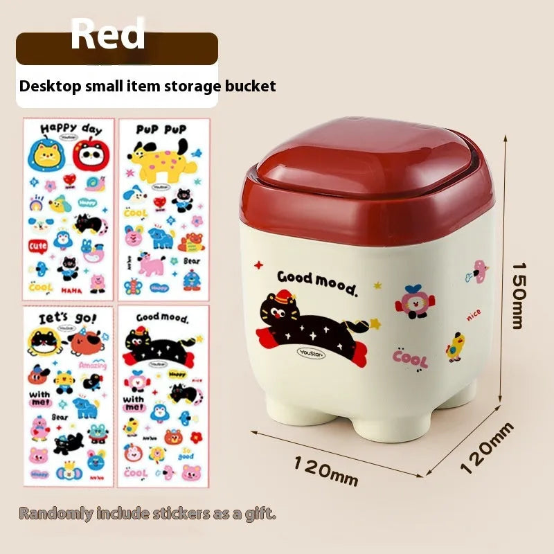 Cartoon-style red and brown plastic desktop storage box with grid compartments for organising pens and stationery.