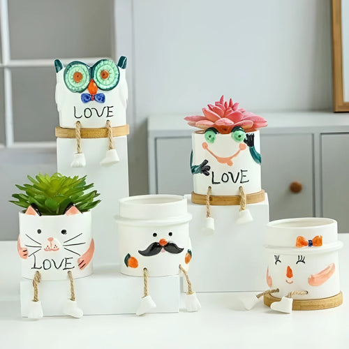 Ceramic hanging foot flowerpot with cartoon design in one of twelve colour variants for succulent plants