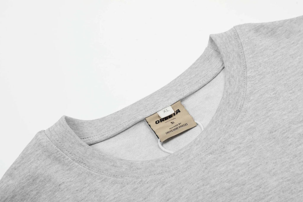 Men's cotton pullover hoodie in loose fit design showing black and grey colour options