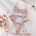 Light purple satin four-piece lingerie set with embroidery detail.